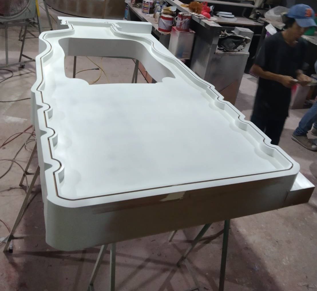 Fabrication of the Serac bottle-shaped feature