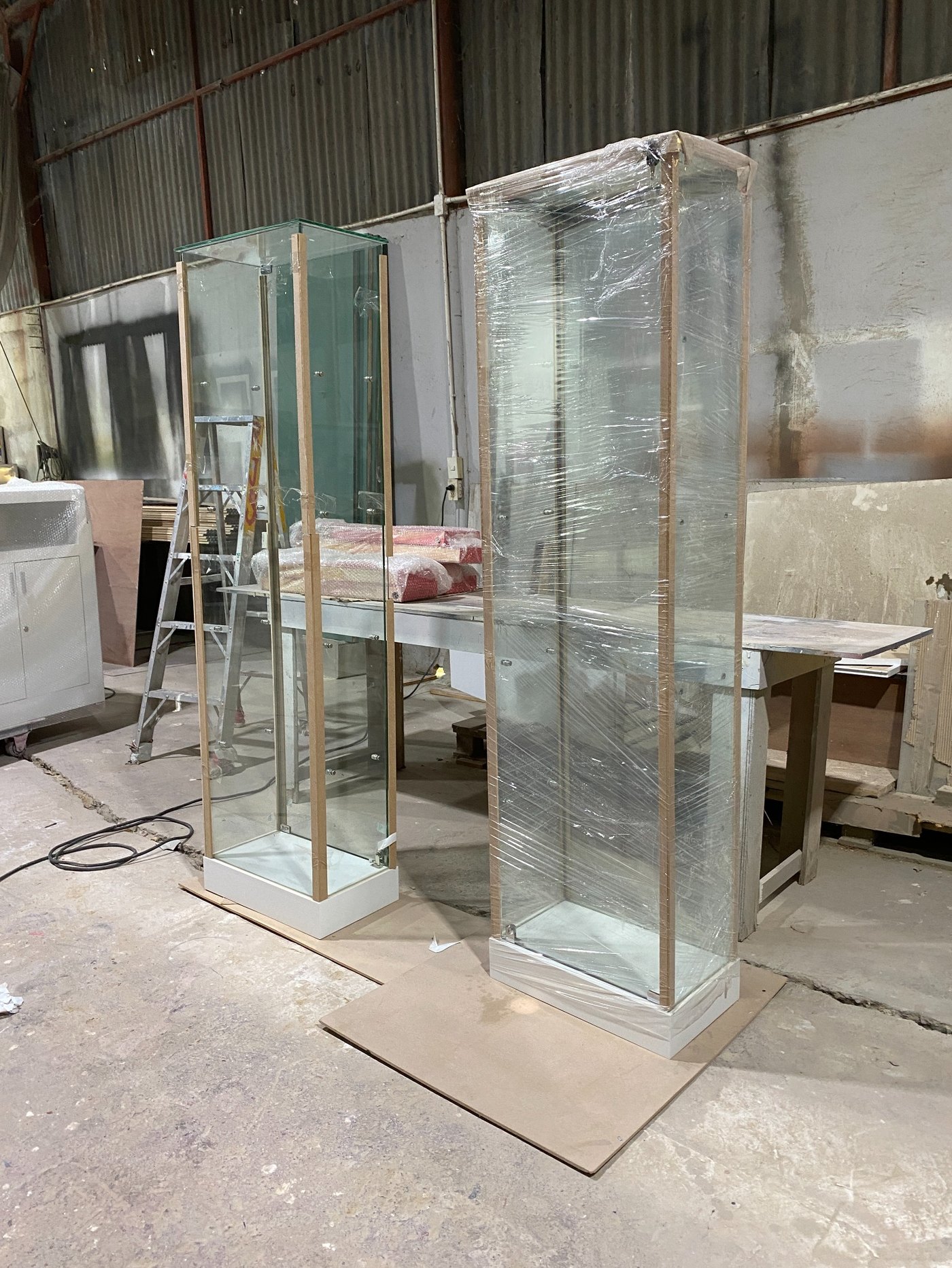 Glass display cabinets fabricated for the Serac booth